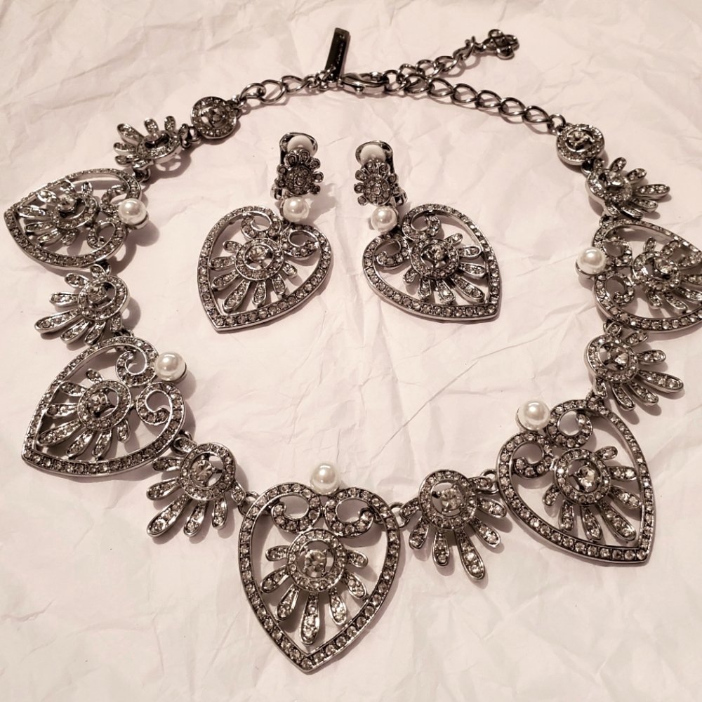 Sold OSCAR DE LA RENTA SILVER NECKLACE AND EARRINGS